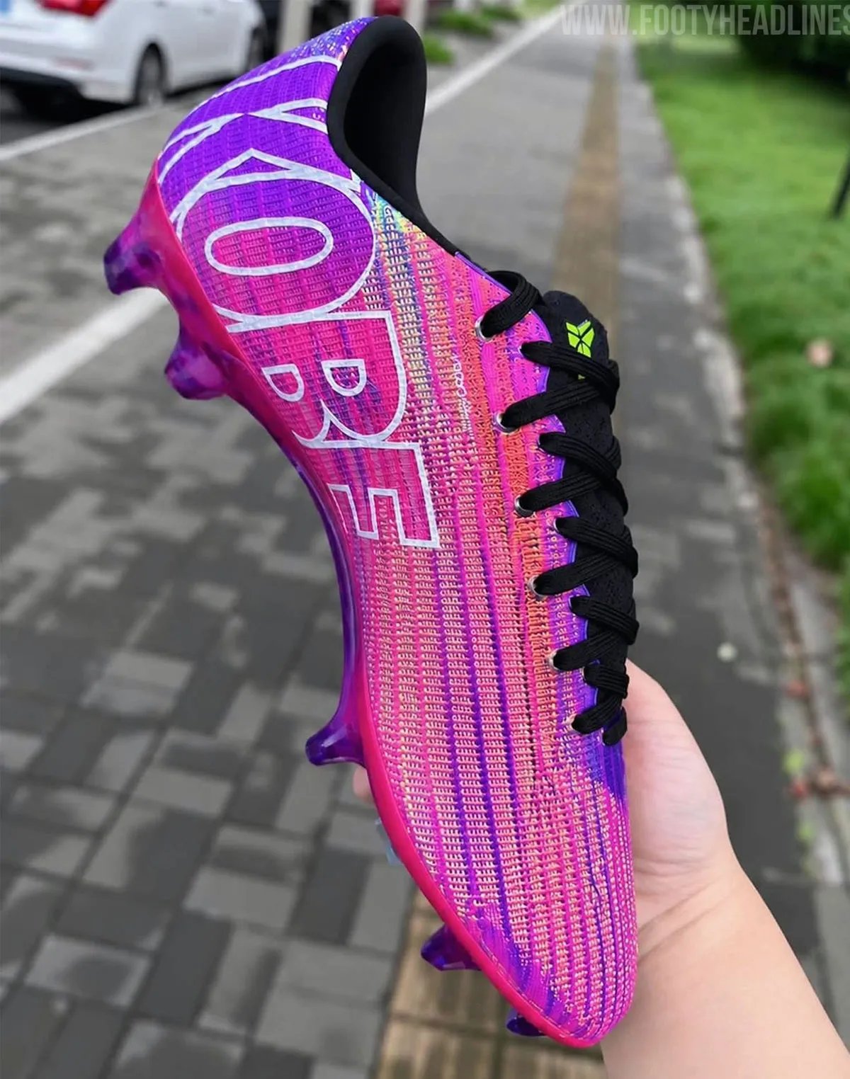 Nike Mercurial Superfly 11 Elite Mambacurial soccer boot in pink and neon green with Kobe branding and gradient purple cleat plate - detail view 1