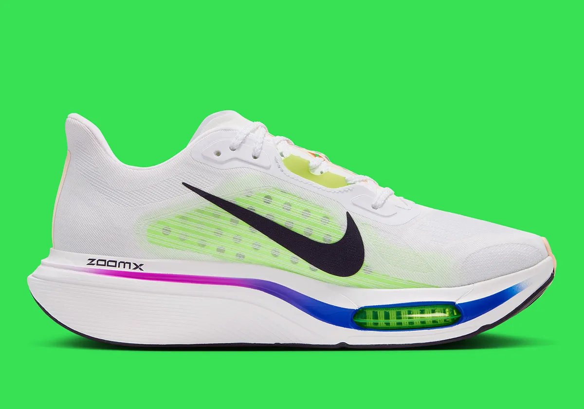 Nike Pegasus Plus 2 in White/Volt colorway featuring visible forefoot Zoom Air and Volt accents - detail view 2