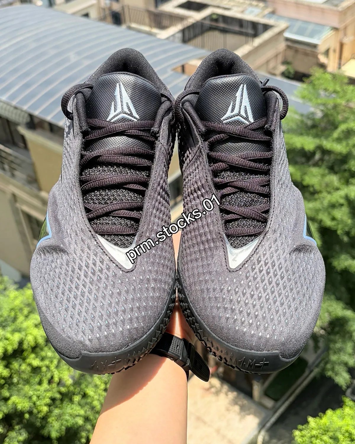 Nike Ja 4 'Dark Mode' in deep grey with chrome metallic 'A' graphic and cobalt accents - detail view 3