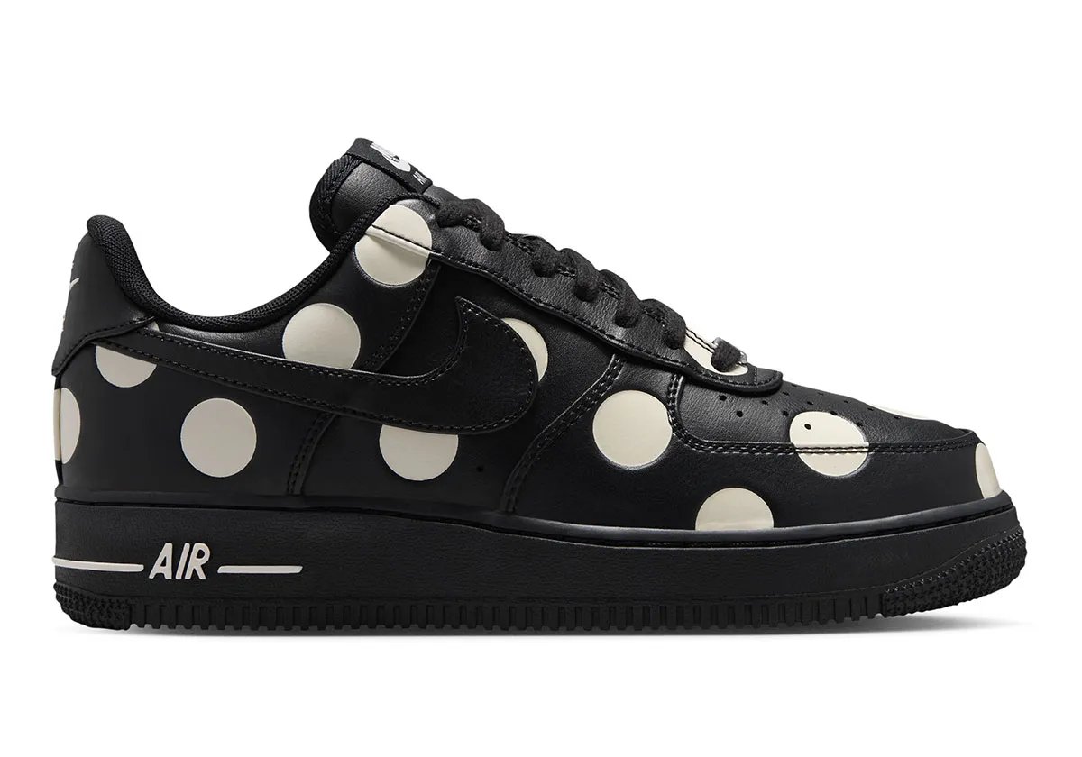 Nike Air Force 1 Low in black leather with cream polka dots, women's colorway, overhead view showing dot pattern across upper - detail view 3