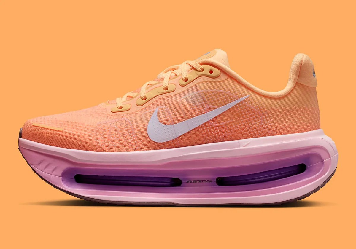 Nike Vomero Premium in Tangerine Tint colorway, showing side profile of the premium lifestyle running shoe - detail view 1