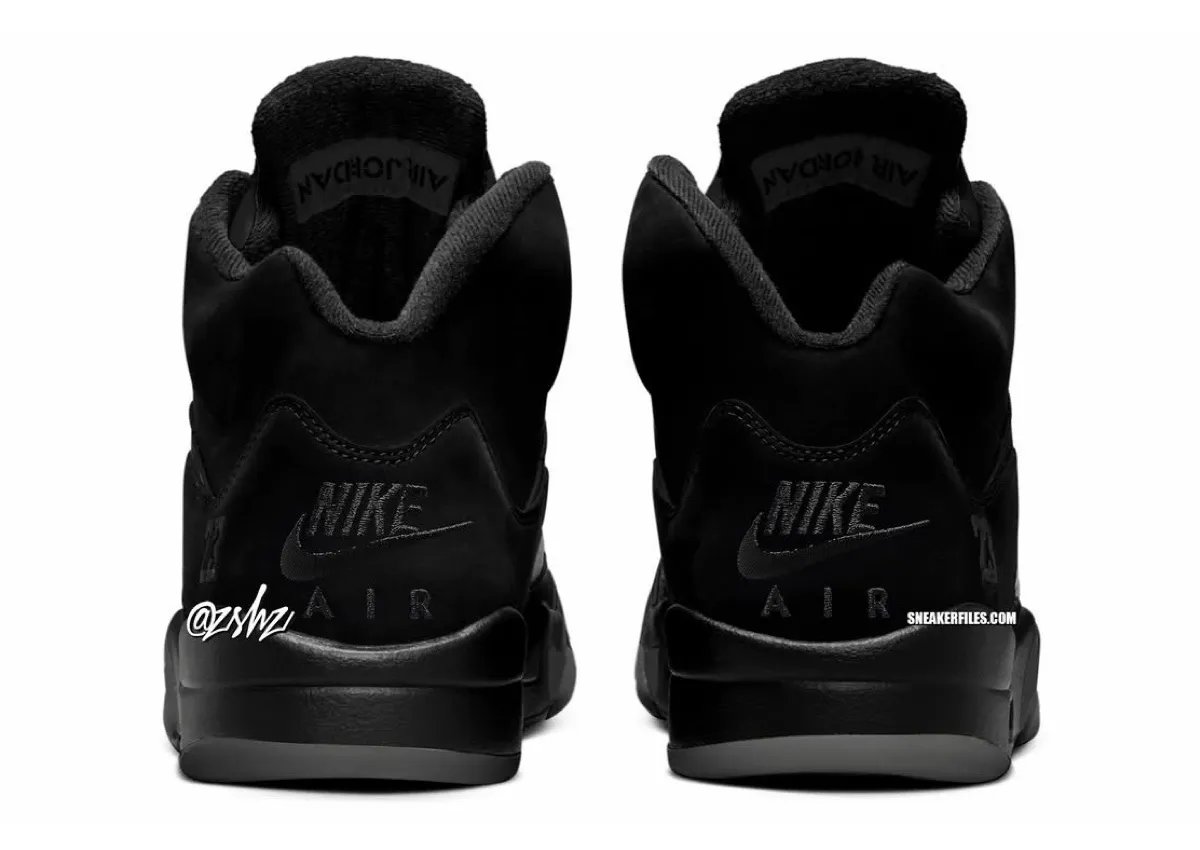 Air Jordan 5 Black Cat in black nubuck with Nike Air heel branding and original-style 23 detailing, scheduled for Fall 2027 - detail view 4