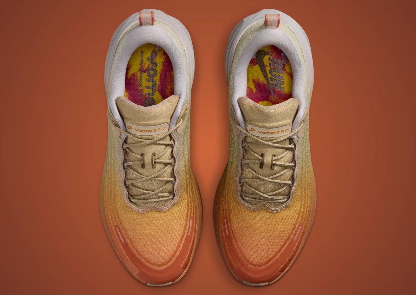 Nike Vomero Plus Cheat Day showing orange-to-grey gradient with Cheeto-inspired insole graphics - detail view 2
