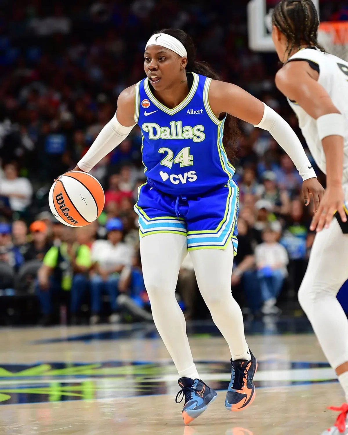 Arike Ogunbowale wearing exclusive Nike Kobe 5 Protro PE with split navy, coral, and blue colorway during Dallas Wings game - detail view 3