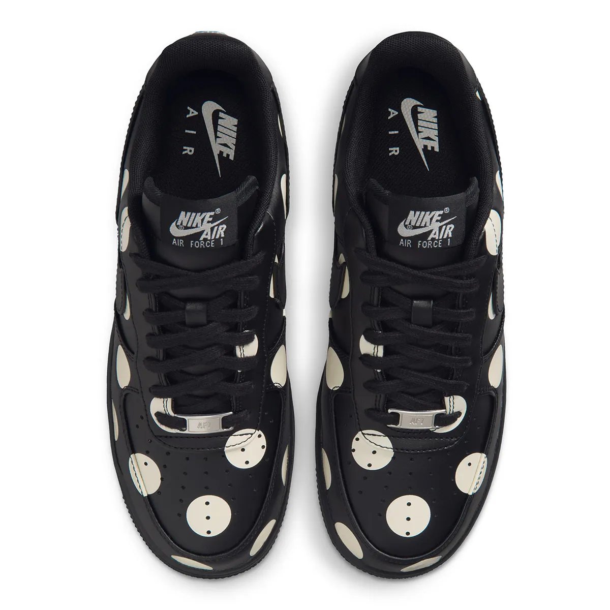 Nike Air Force 1 Low in black leather with cream polka dots, women's colorway, overhead view showing dot pattern across upper - detail view 4