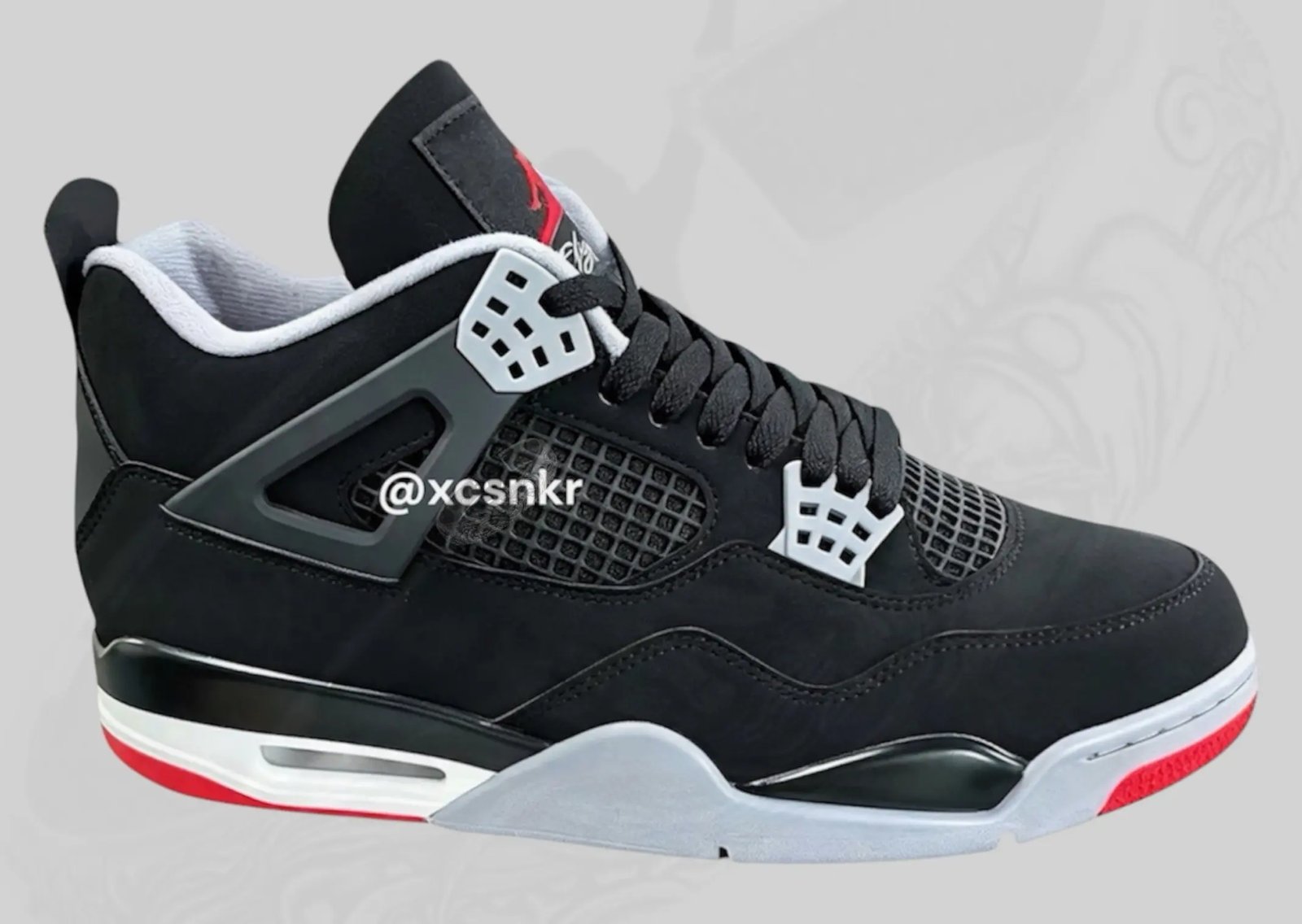 Air Jordan 4 Retro Bred in black nubuck with grey lace wings and red accents, OG 1989 colorway recreation - detail view 2