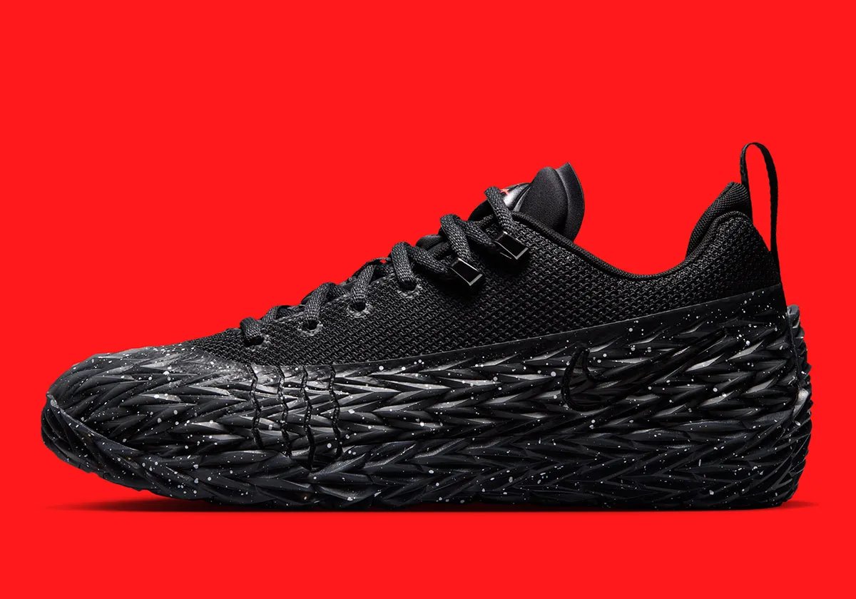 Nike S.T. Charge Black/Bright Crimson with white speckling on MonSTer Skin upper, outdoor basketball silhouette - detail view 1