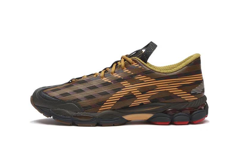 Kiko Kostadinov x ASICS GEL-SJ33 in Black Coffee/Orange Lily colorway, showcasing seamless upper construction and striped graphic patterns - detail view 1