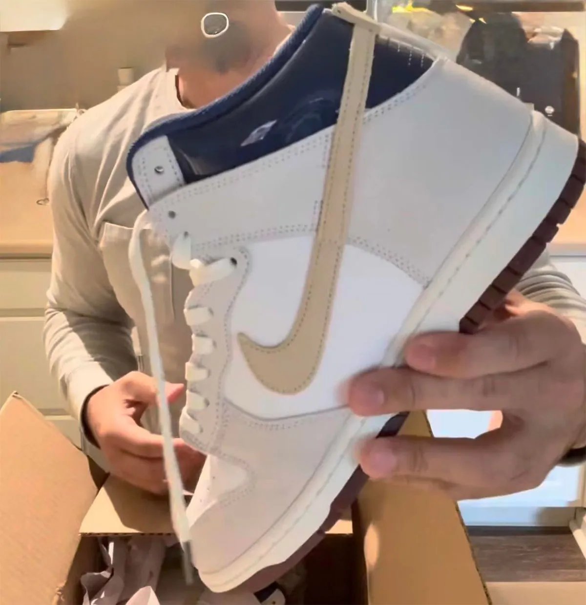 Nike SB Dunk High in white leather and ivory suede with Blue Void patent leather collar, arriving July 2026 via Beyond - detail view 2