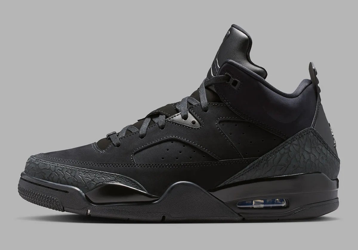 Jordan Son Of Mars Low in Black Cat colorway, full monochromatic black upper with visible Air unit and hybrid design elements from Air Jordan 3-6 - detail view 1