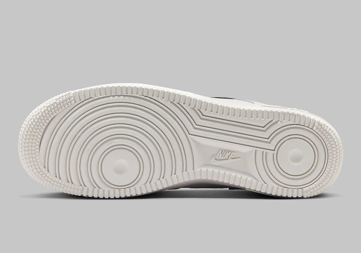 Nike Air Force 1 Low in Phantom with metallic silver mini Swoosh detail at quarter panel - detail view 2