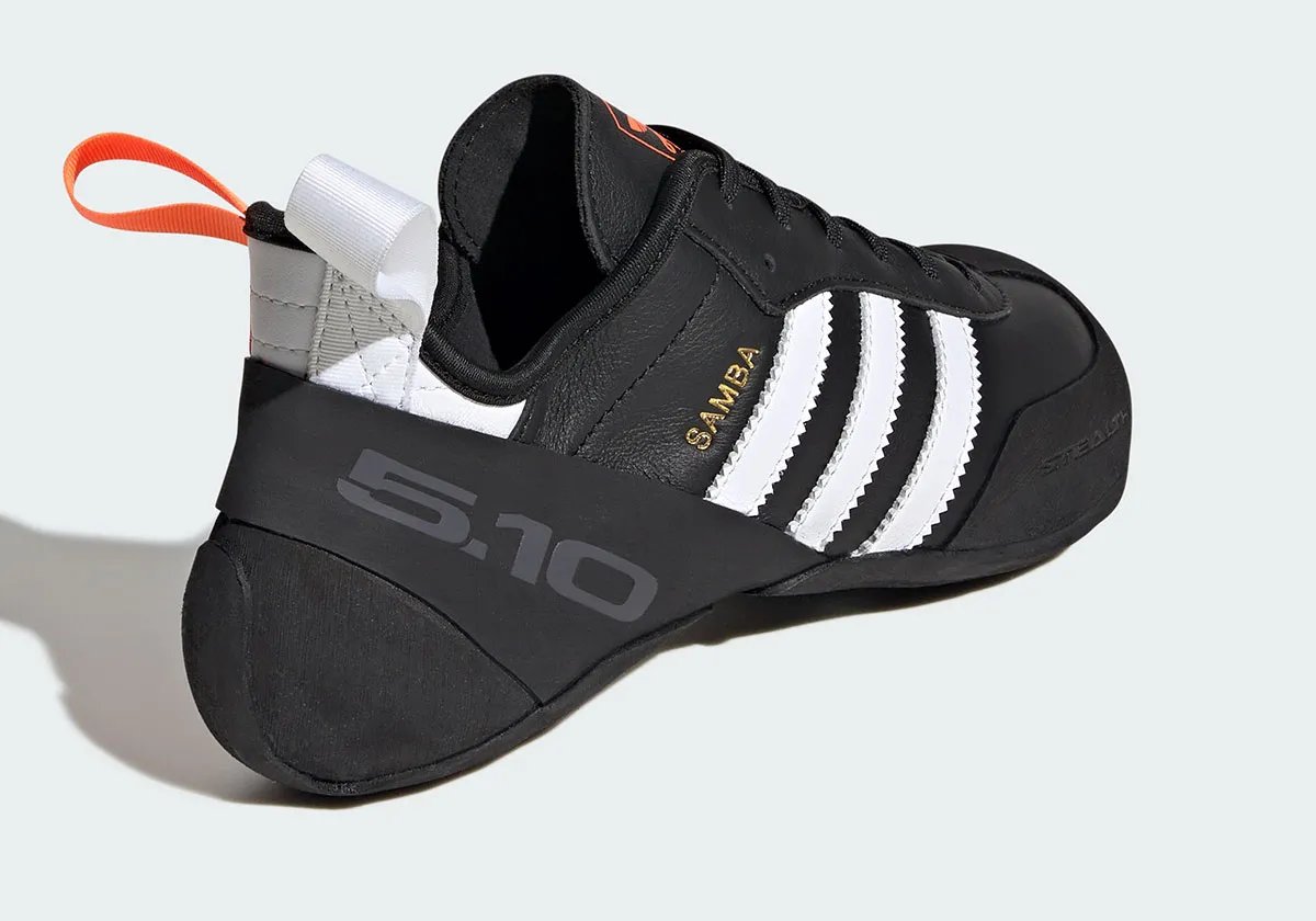 Adidas Samba Climbing Shoe in black, white, and orange colorway with curved Five Ten STEALTH Rubber outsole - detail view 1