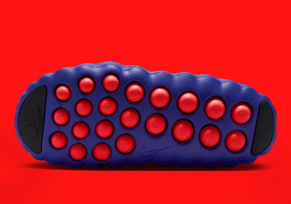 Nike Mind 001 Indigo Burst Hyper Punch colorway showcasing the neuroscience-backed design with circular nodes and vibrant blue and pink colorway - detail view 2