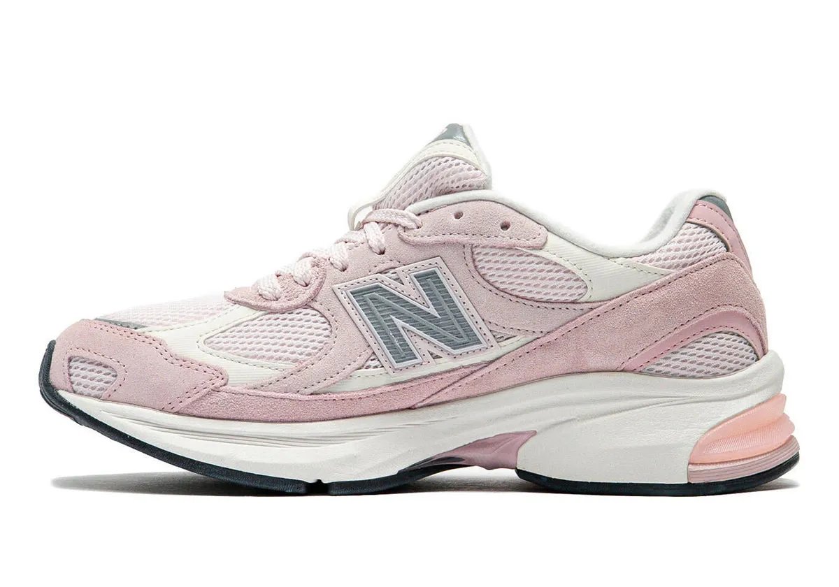 New Balance 2010 in Pink Chalk colorway, side profile view showcasing pastel tone and 99x-inspired design elements - detail view 1
