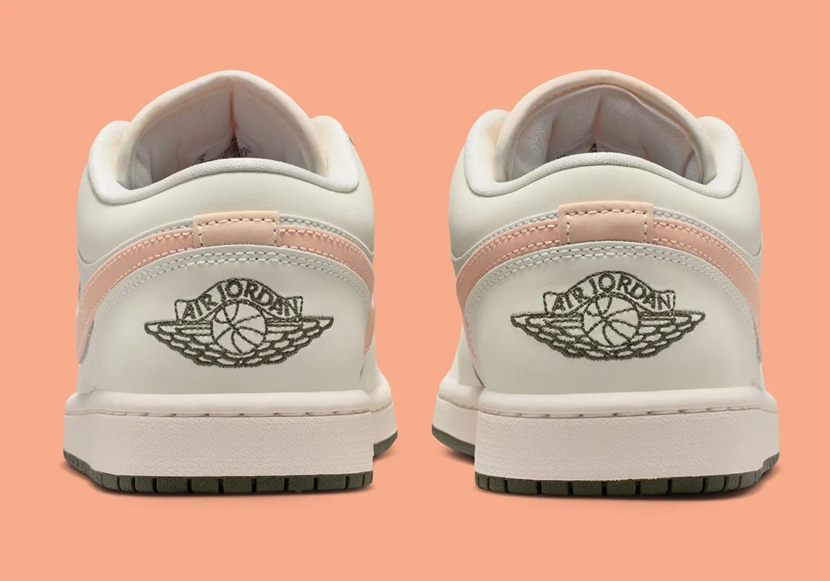 Nike Air Jordan 1 Low in Crimson Tint colorway, showing leather construction and ankle collar detail - detail view 4