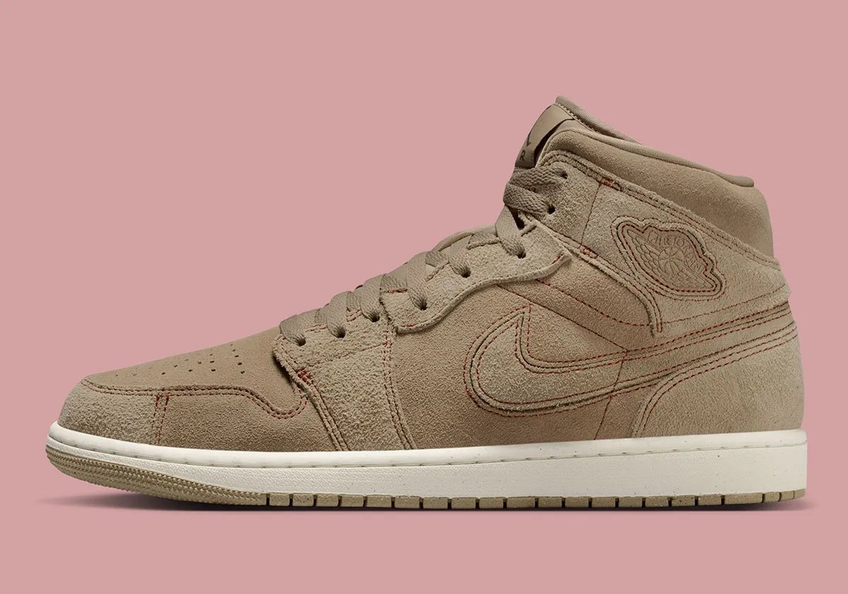 Air Jordan 1 Mid in Pecan colorway, showcasing premium leather construction and warm neutral tone from the Jordan Brand Craft collection - detail view 1