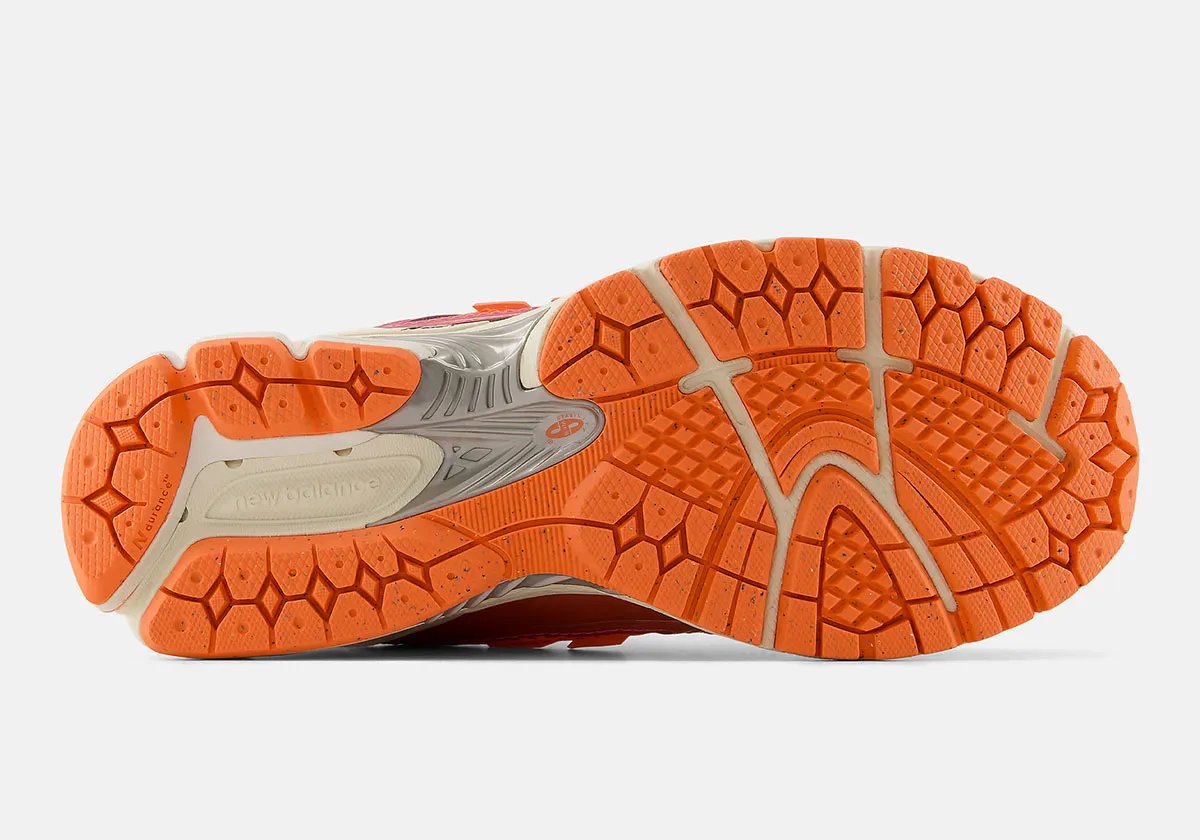 New Balance 1906R Creamsicle colorway featuring cream and soft orange tones on mixed-material upper with chunky sole - detail view 3