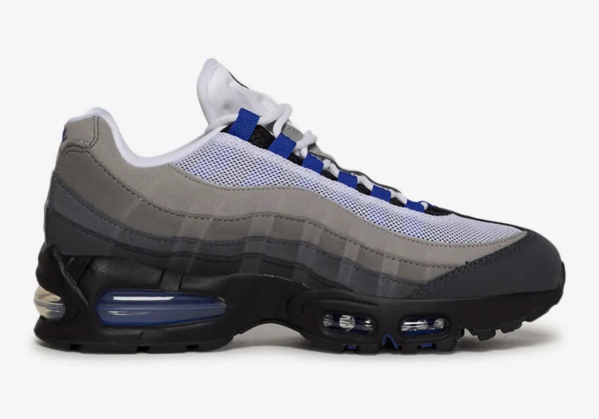 Nike Air Max 95 Old Royal women's sneaker in deep navy blue with white mesh and neutral grey sidewalls - detail view 2