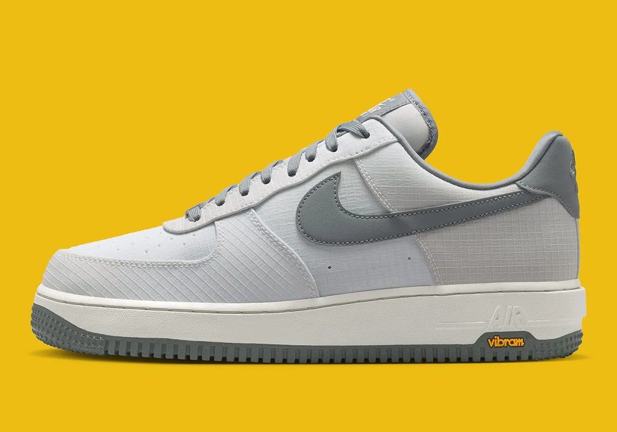 Nike Air Force 1 featuring Vibram outsole technology in neutral colorway, detail shot showing grip-focused rubber sole pattern - detail view 1