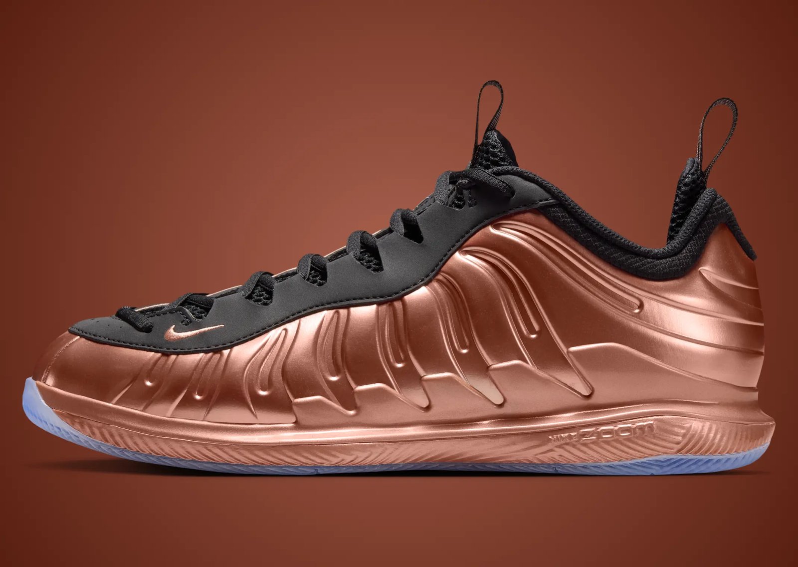 Nike Zoom Vapor X Posite in Copper colorway featuring Foamposite-inspired panels and icy blue outsole - detail view 3