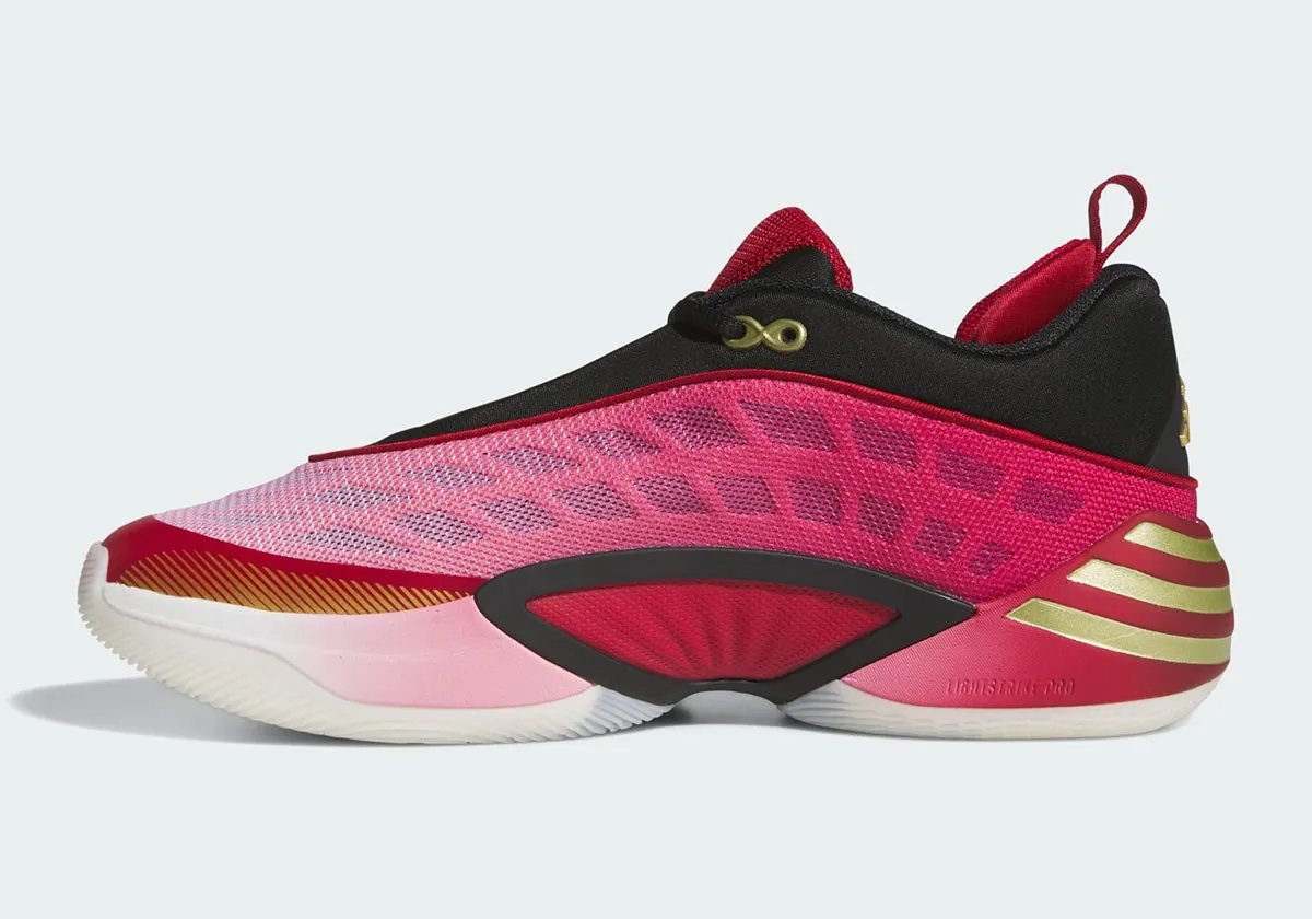 Adidas DON Issue #8 in Cavaliers wine, red, and gold colorway with gradient mesh upper and metallic gold branding - detail view 2
