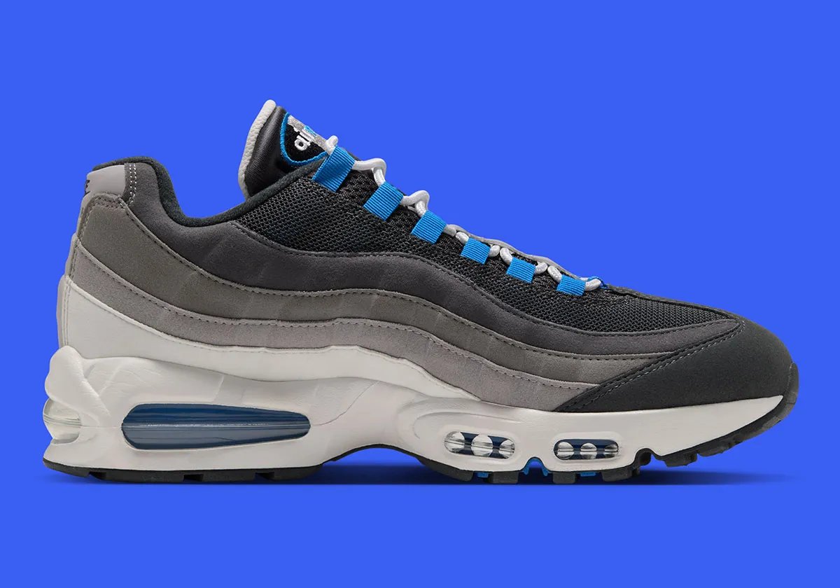 Nike Air Max 95 "Reverse Blue Spark" featuring inverted colorway with Blue Spark accents on Swoosh, tongue, and Big Bubble Air unit, white midsole, and black tongue - detail view 3