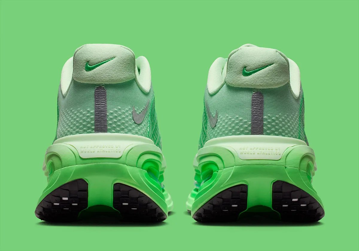 Nike Vomero Premium in Cucumber Calm colorway featuring sage green mesh upper with Illusion Green and Green Spark accents on Zoom Air windows - detail view 4