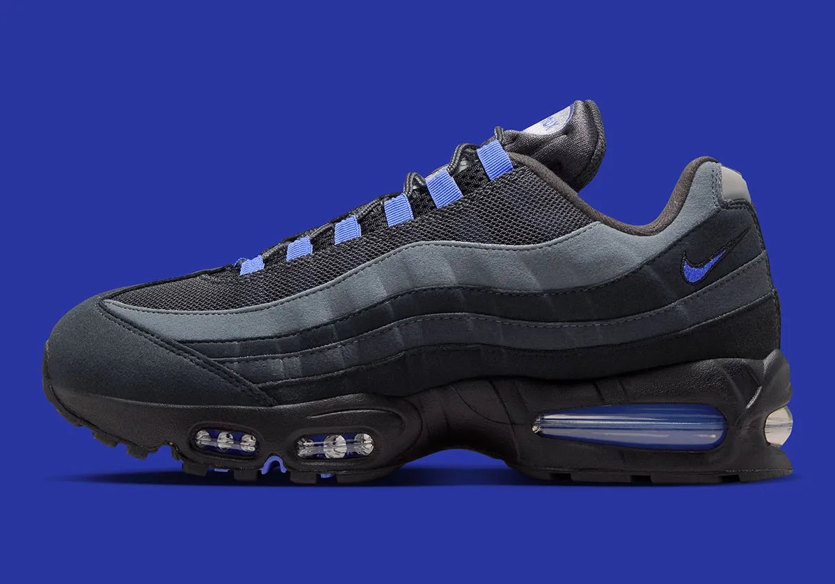 Nike Air Max 95 Sapphire in lateral profile view showing the distinctive dual-bubble Air Max unit and jewel-tone upper construction - detail view 1