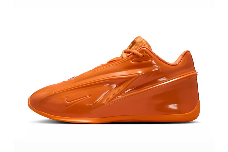 Nike KD 19 Orange Crush colorway featuring bright ceramic orange with stadium green and university gold accents - detail view 2