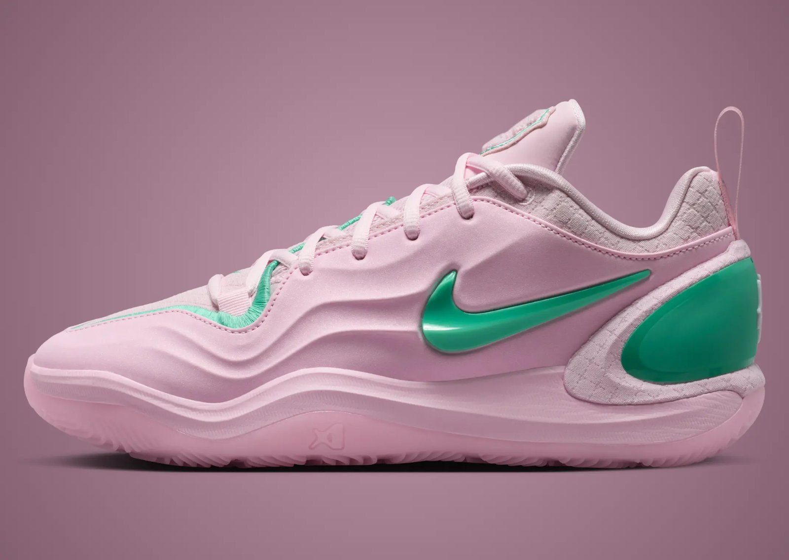 Nike A'Two Pinkies Up in pink and green Alpha Kappa Alpha colors, shown from side angle with embroidered toebox border and green Swoosh detail - detail view 2