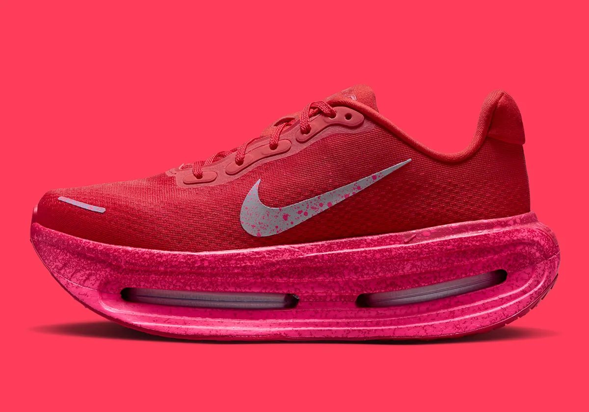Nike Vomero Premium in University Red with speckled detailing and Hyper Pink sole unit - detail view 1