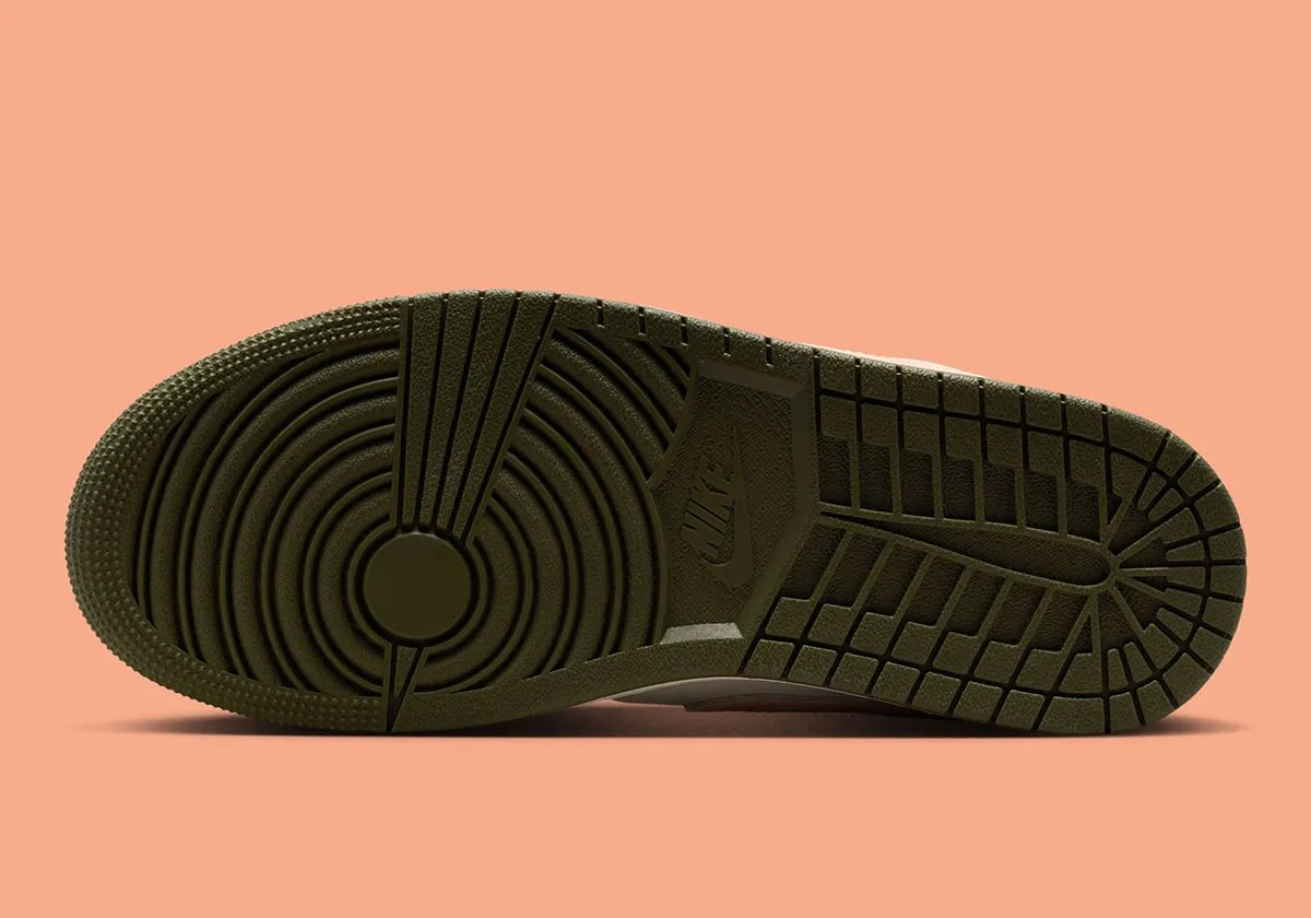 Nike Air Jordan 1 Low in Crimson Tint colorway, showing leather construction and ankle collar detail - detail view 5