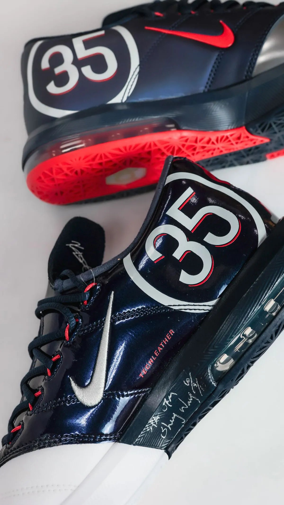 Paris Saint-Germain x Nike KD 6 in white, navy, and red colorway with stitched football boot detailing - detail view 1