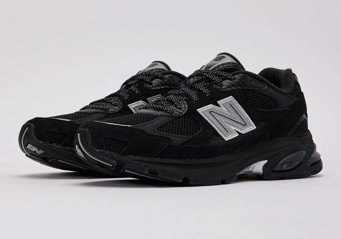 DTLR x New Balance 2010 Carbon Fiber exclusive sneaker with black mesh, silver N-logo branding, and carbon fiber heel detailing - detail view 2