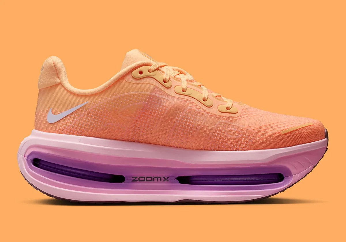 Nike Vomero Premium in Tangerine Tint colorway, showing side profile of the premium lifestyle running shoe - detail view 2