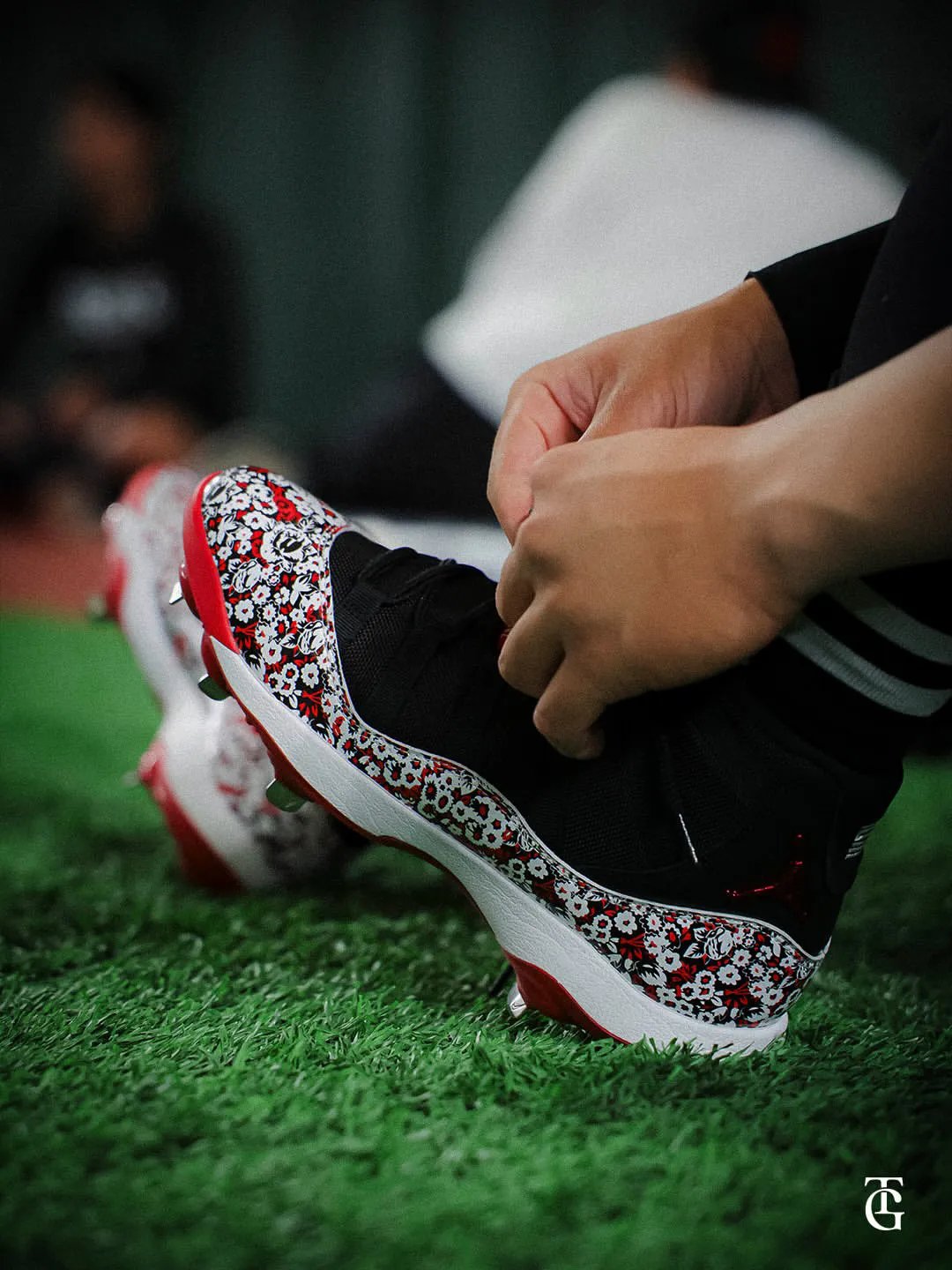 Nike Air Jordan 11 Cleat in black with dense red, white, and grey floral pattern, designed exclusively for the Yomiuri Giants - detail view 4