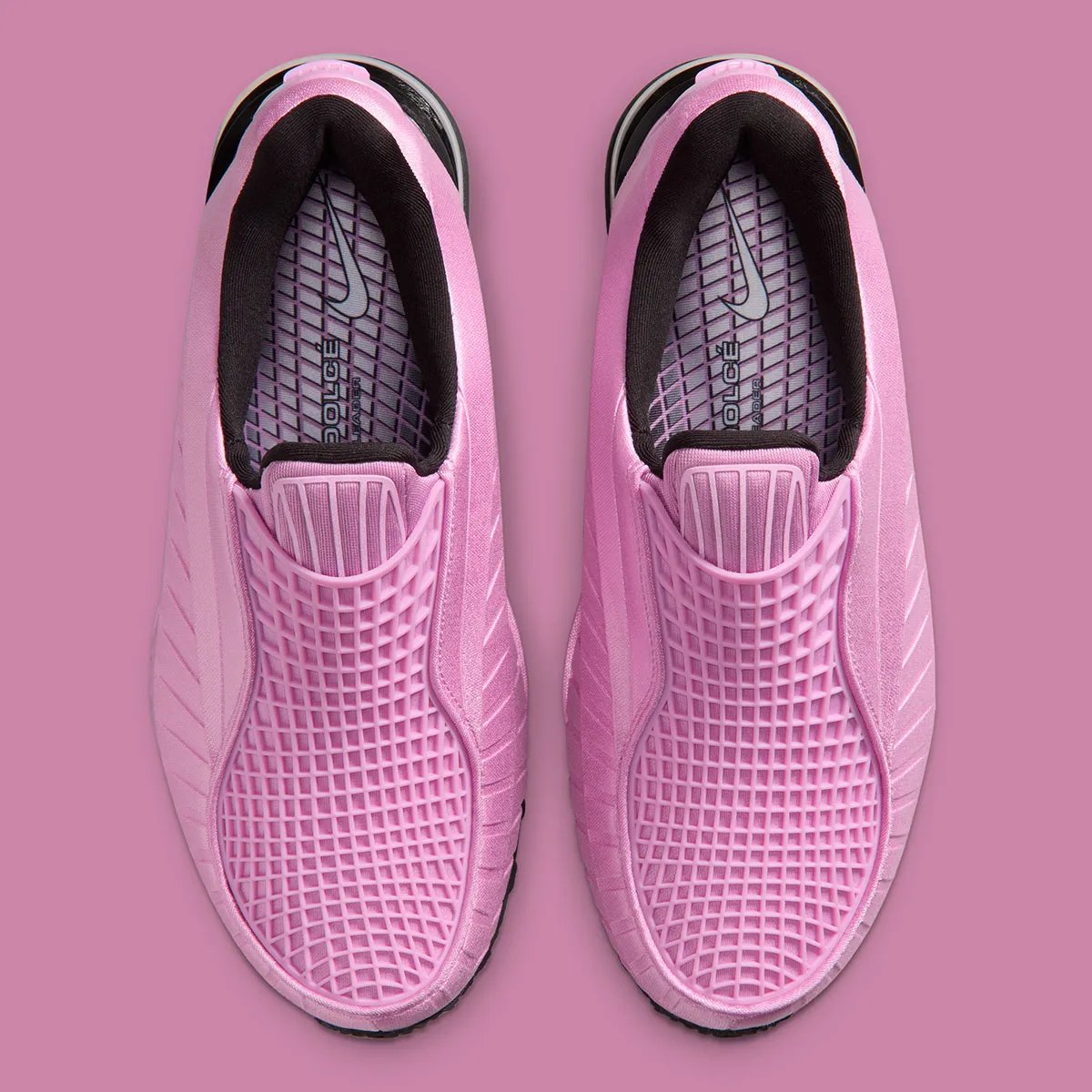 Nike Air Max Dolce Light Magenta colorway featuring gridded tongue cage, notched side panels, and translucent Air bubble sole - detail view 3