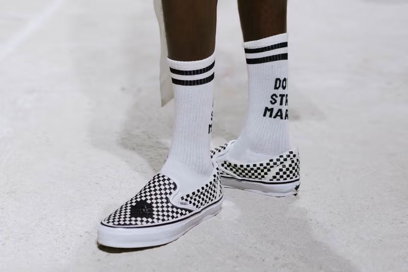 DSM Kei Ninomiya x Vans Slip-On collaboration with custom floral overlays and branded details - detail view 3