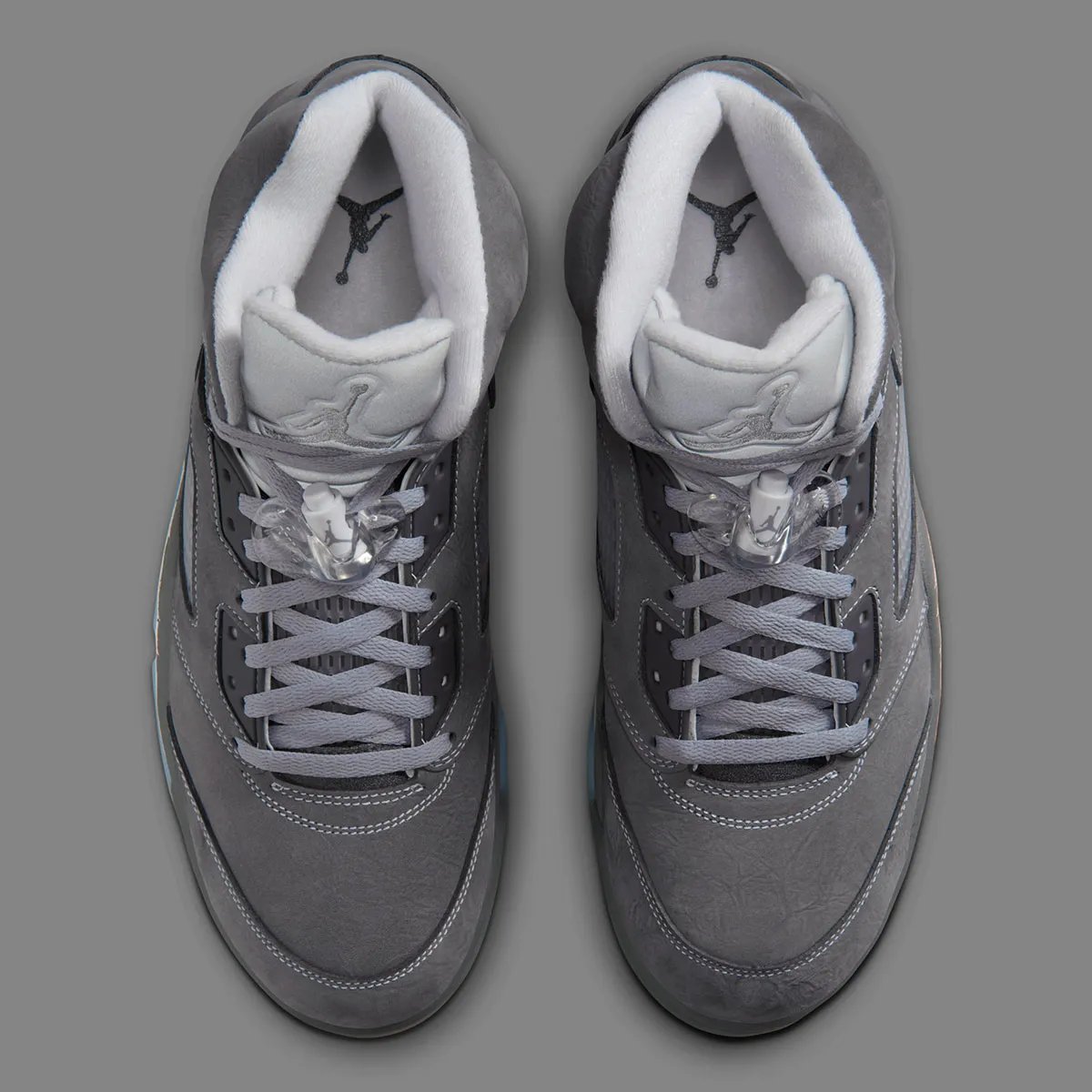Air Jordan 5 Wolf Grey colorway, full side profile view showing shark-tooth midsole and lace-lock system - detail view 4
