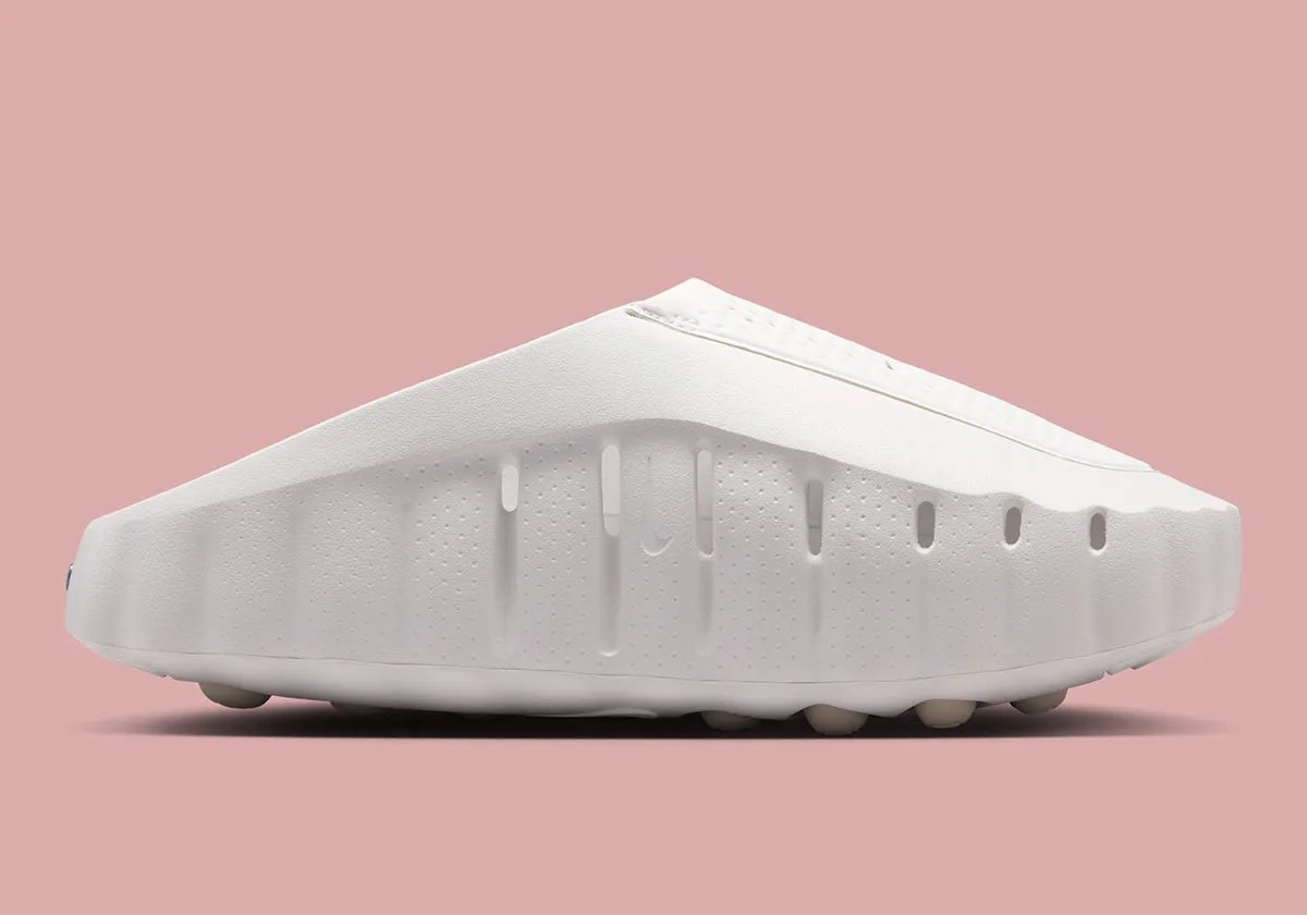 Nike Mind 001 recovery slide in Summit White with Metallic Silver Swoosh and light tan midsole, women's exclusive colorway - detail view 2