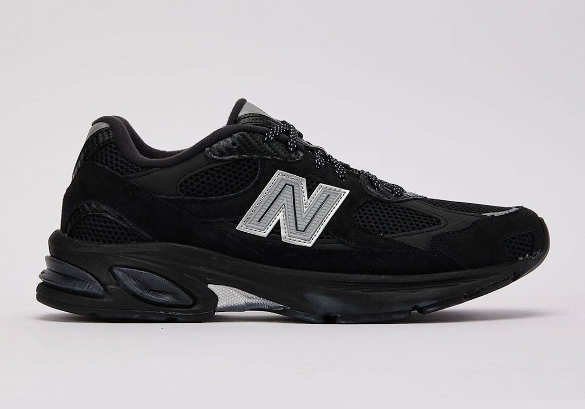 DTLR x New Balance 2010 Carbon Fiber exclusive sneaker with black mesh, silver N-logo branding, and carbon fiber heel detailing - detail view 3