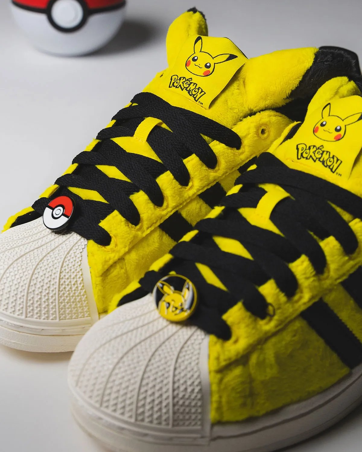adidas Pokemon 30th Anniversary Collection featuring multiple Pokémon characters across Superstar and Adistar silhouettes - detail view 3