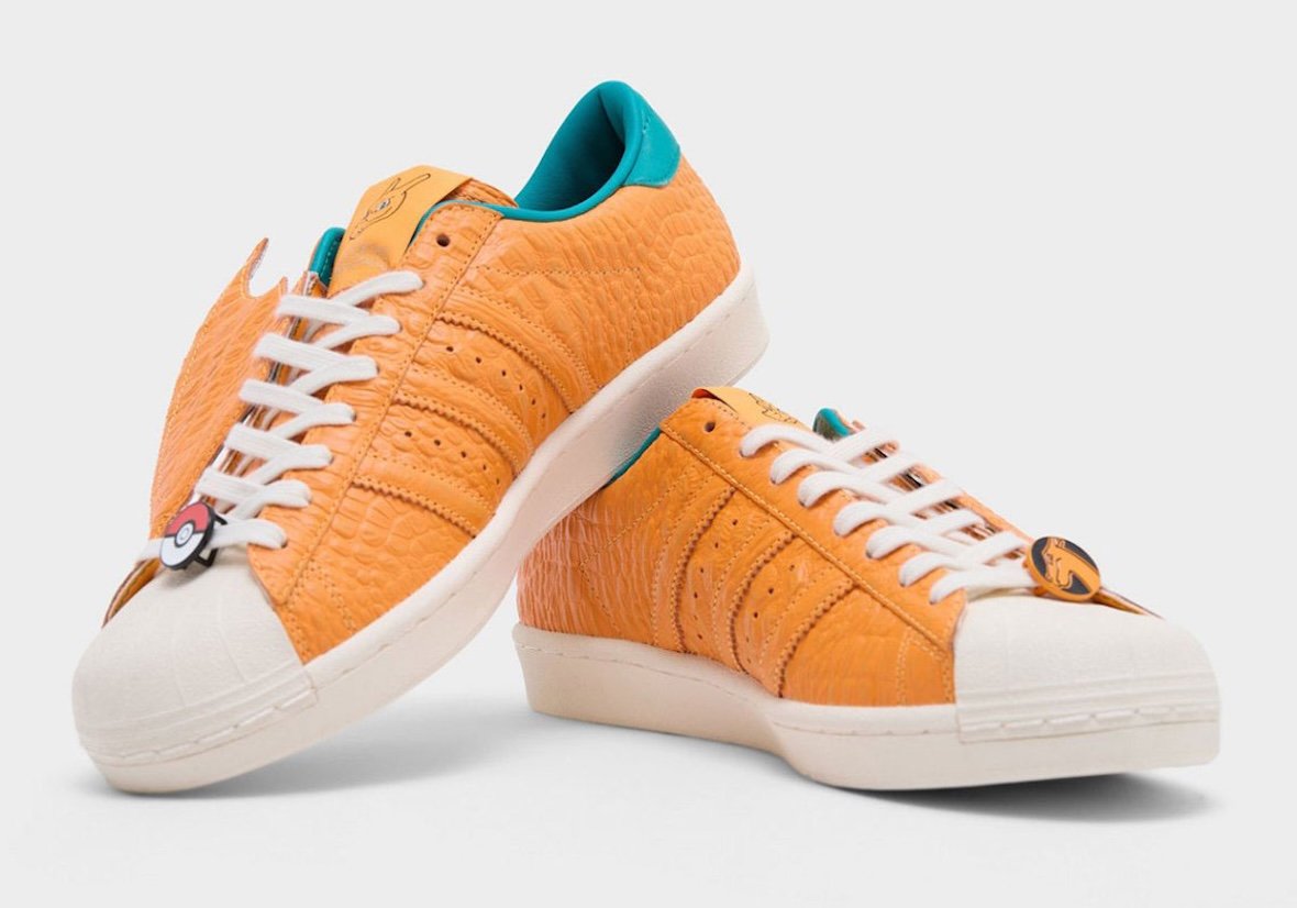 adidas Superstar with Charizard design featuring orange textured leather and removable leather wings - detail view 3
