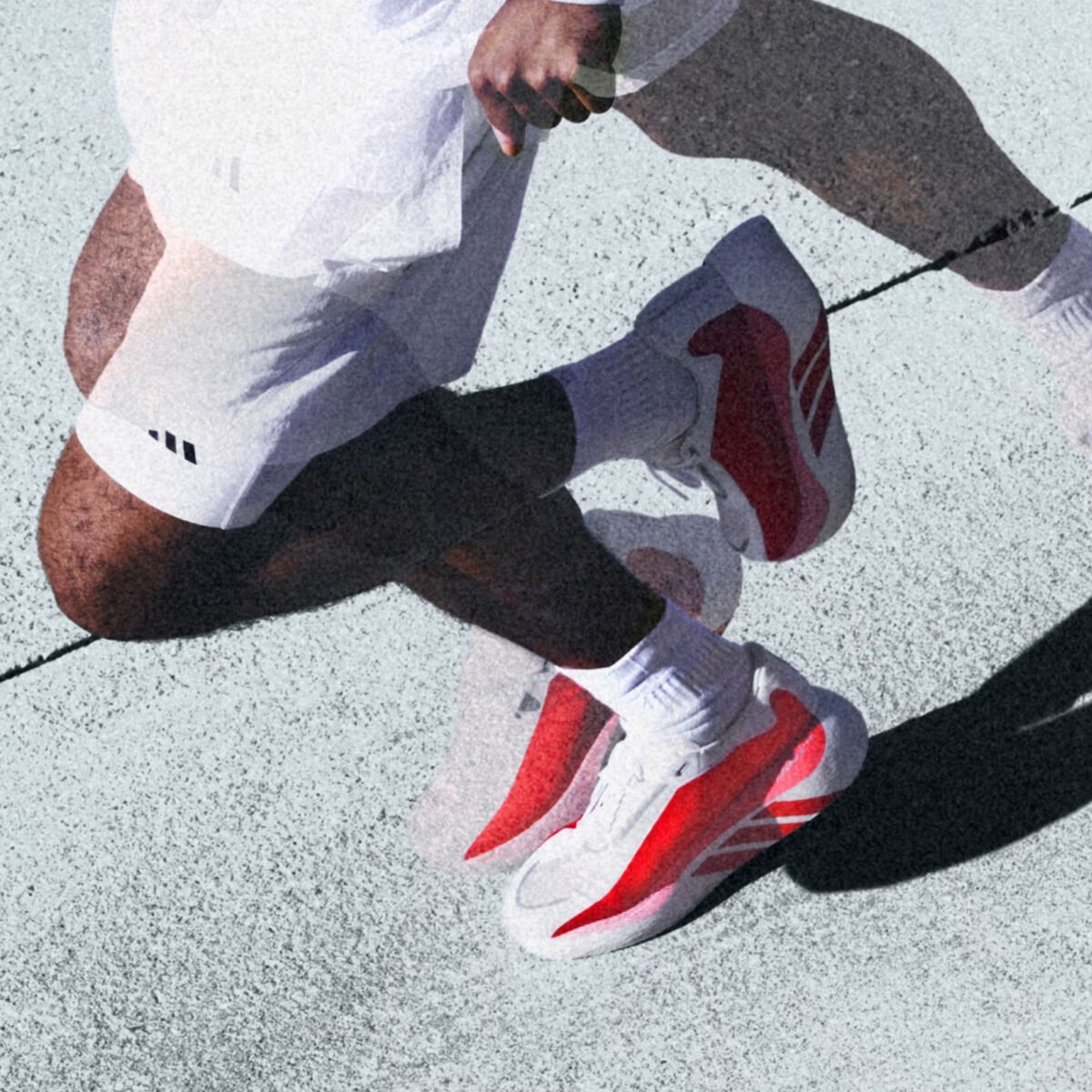 adidas Hyperboost Edge running shoe in neutral colorway showing cushioned midsole and minimalist upper design - detail view 5