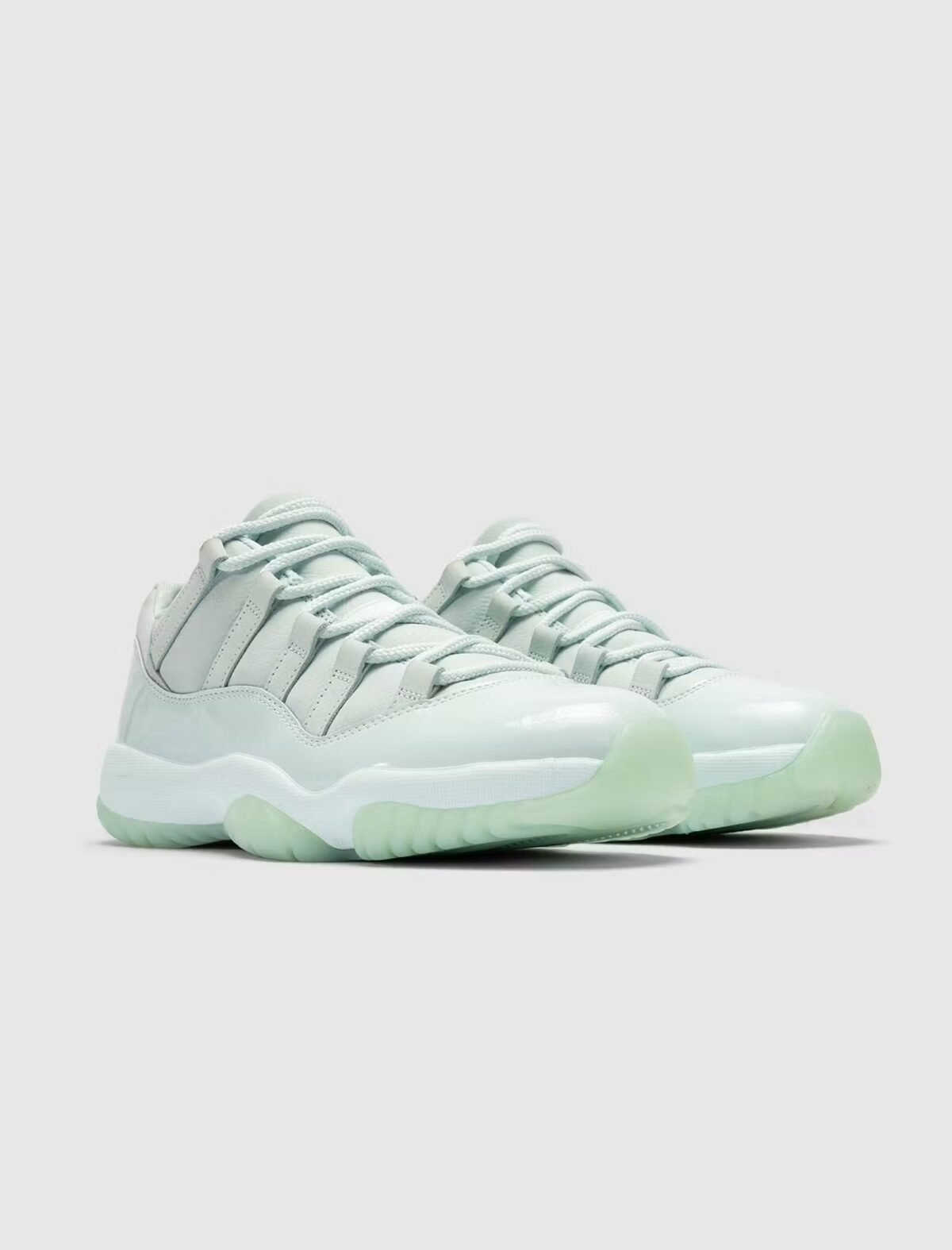 JAIDE x Air Jordan 11 Low WMNS 'Fiberglass' in fiberglass, white, and black colorway - detail view 1
