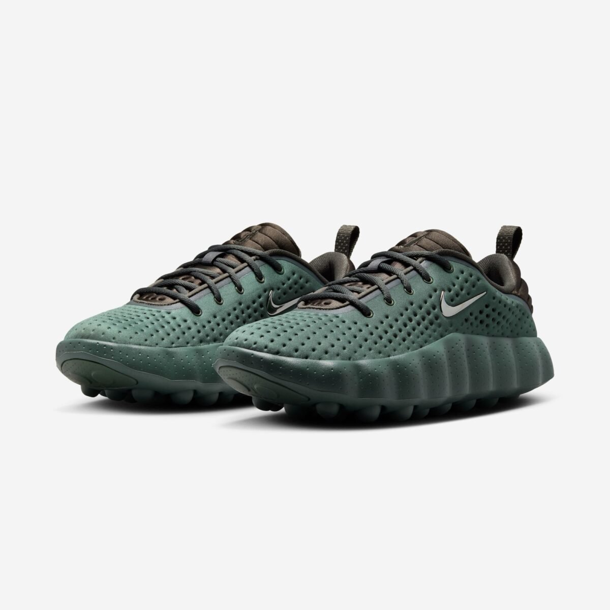 Nike Mind 002 Camo Green colorway with newsprint and phantom accents, releasing July 23, 2026 - detail view 1