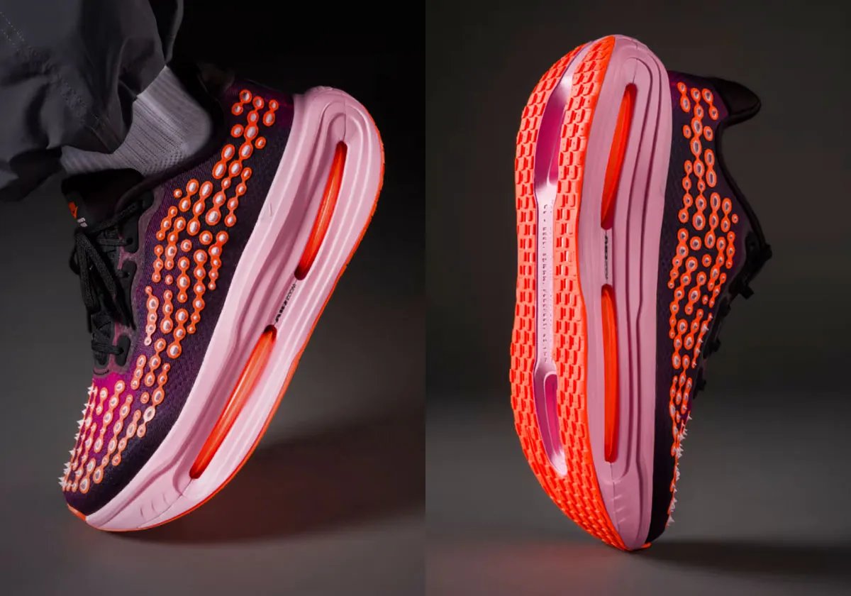 Nike Vomero Premium SP with spiked construction in dusky purple and neon pink colorway - detail view 2