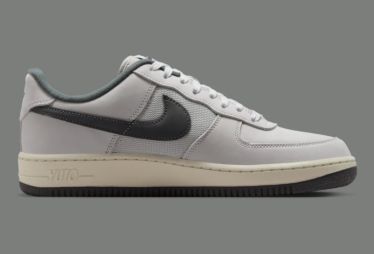 Yuto Horigome x Nike SB Air Force 1 Iron Grey featuring off-white leather upper with grey mesh panels and personalized heel branding - detail view 4
