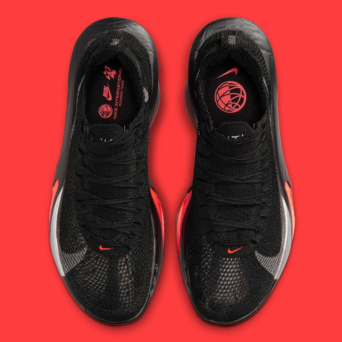 Nike Alphafly 3 in Black, Hyper Crimson, and Wolf Grey with silver Swoosh carabiner clip - detail view 4