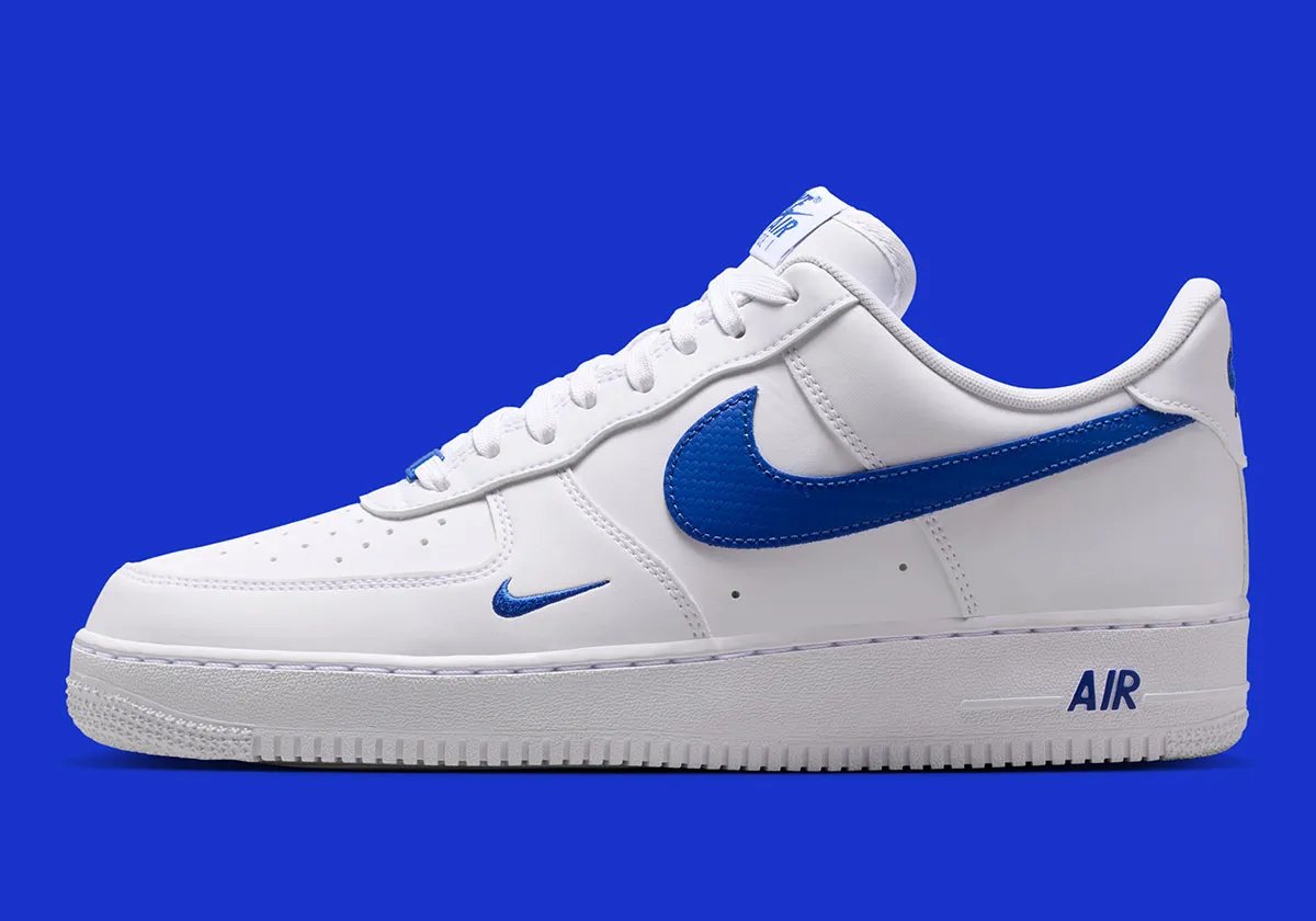 Nike Air Force 1 Low in White with Game Royal carbon fiber Swoosh and accents, lateral view - detail view 1